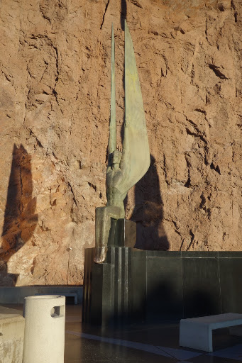 This sculpture, one in a pair, is called The Winged Figures of the Republic. The creator, Oskar J.W. Hansen, was inspired by the pyramids of Egypt.