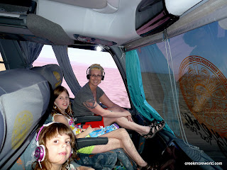 On the front of the double decker bus for the drive throgh the desert.