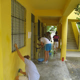 Scrubbing down walls.