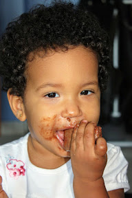 Malaika enjoying her first ever Tim Tam Malaika enjoying her first ever Tim Tam