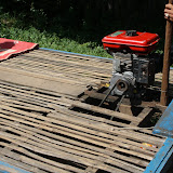Bamboo lever is used to slide the engine and make the belt taught.