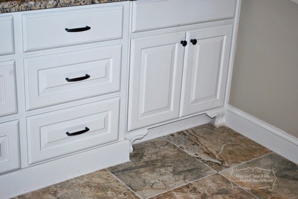 Curved feet detail of floor molding on bathroom cabinets.jpg Curved feet detail of floor molding on bathroom cabinets