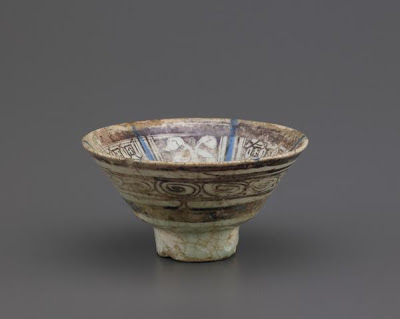 Rakka ware bowl | Origin:  Raqqa,  Syria | Period: 12th-13th century | Details:  Not Available | Type: Stone-paste with cobalt under colorless transparent alkali-silicate glaze, luster over glaze | Size: H: 6.5  W: 12.3  cm | Museum Code: F1908.125 | Photograph and description taken from Freer and the Sackler (Smithsonian) Museums.