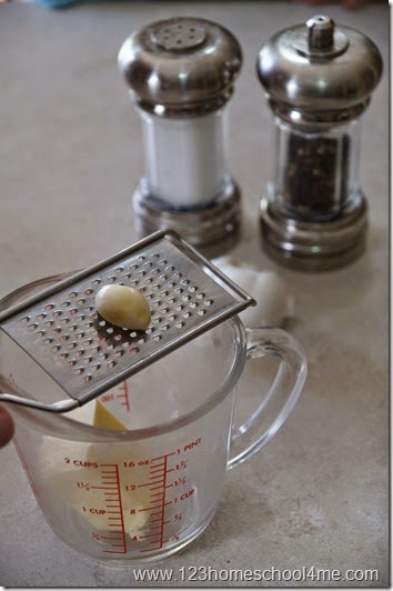 Grate garlic in with the butter Grate garlic in with the butter