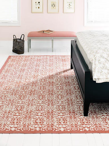 The pattern on this rug is so intricate. The darker shade brings an imperative contrast to the pastels of the room, proving area rugs can be as much a statement piece as a background color. The pattern on this rug is so intricate. The darker shade brings an imperative contrast to the pastels of the room, proving area rugs can be as much a statement piece as a background color.