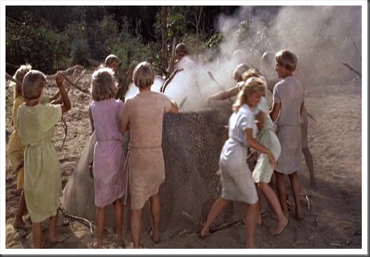 181. The Eloi toss wood down the shafts 181. The Eloi toss wood down the shafts