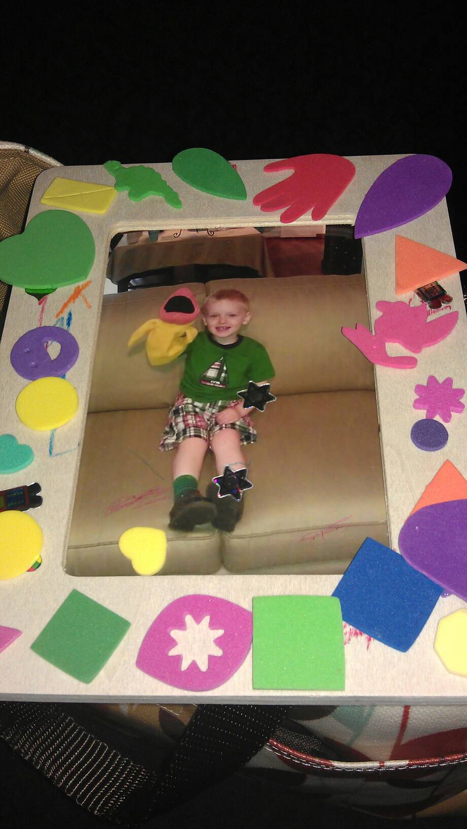 Andy made a picture frame at rainbow