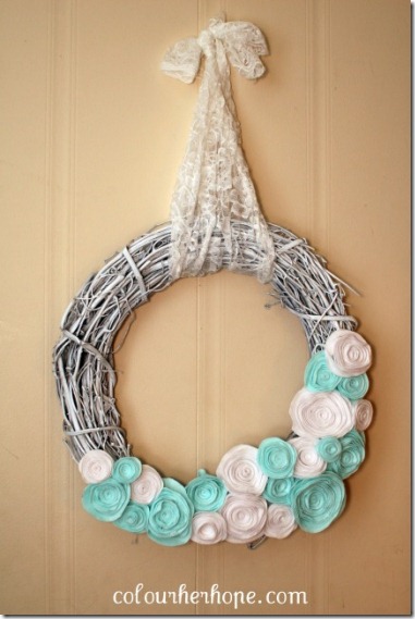 Winter wreath--white grapevine wreath with white and blue rolled fabric flowers