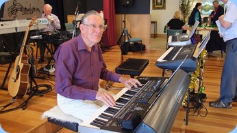 Roy Steen playing the Korg Pa3X. Photo courtesy of Dennis Lyons.