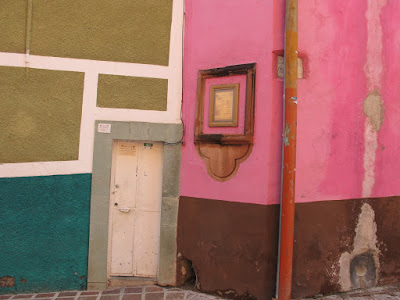 all the buildings are painted bright colors