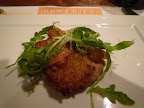 Paneed (crumb coated) Louisianna grass-fed veal with arugula.