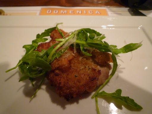 Paneed (crumb coated) Louisianna grass-fed veal with arugula.