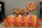 Bryan's own take on color for our set including a pretty ombré tablecloth and lots of bright flowers and candles.