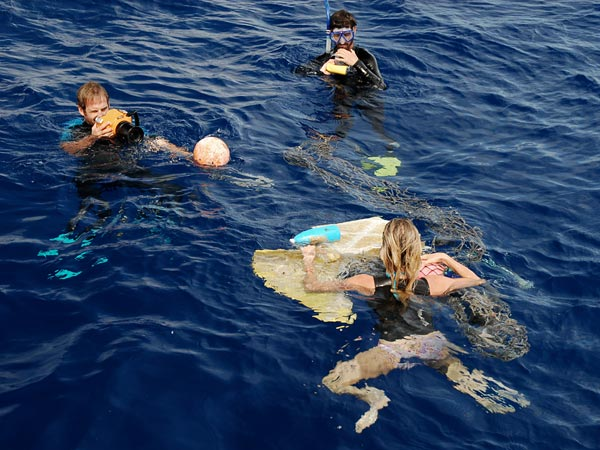 A paying passenger (bottom) on an ocean garbage patch research cruise (file picture). Photograph courtesy Stiv Wilson, 5gyres.org