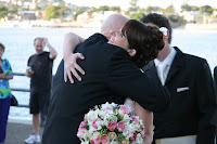 Hugging the father of the bride