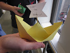 The deeper folds would allow you to use the boats to hold candies or nuts for your guests to enjoy as party favors. A hit at the kids' table, no doubt.