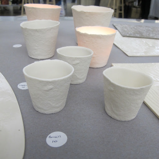 These ceramic votives are from crafter Marcie McGoldrick. http://marciemcgoldrick.com/