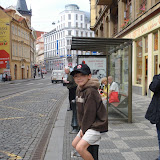 Kai waiting for a tram on Vodivocka Street