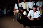 The war dance is a ritualized dance and confrontation from times gone by when the Achuar lived in constant warfare. Today the Achuar are united and peaceful, but they complain that the oil company Talisman is provoking division and violence amongst the Achuar.