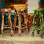 These are stools studded with shells, mirrors, buttons and ceramics, we've seen quite a few of these.