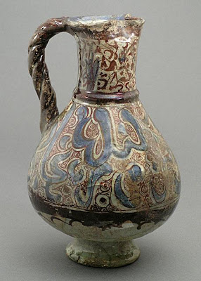 Ewer | Origin: Syria | Period: late 12th-early 13th century | Collection: The Madina Collection of Islamic Art, gift of Camilla Chandler Frost (M.2002.1.38) | Type: Ceramic; Vessel, Fritware, underglaze and overglaze luster-painted, Height: 9 3/4 in. (24.76 cm)
