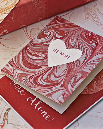 The dreamy curves of marbleizing lend themselves to a number of decorative paper crafts, including this Valentine's Day card with a heart cut-out.(marthastewart.com) The dreamy curves of marbleizing lend themselves to a number of decorative paper crafts, including this Valentine's Day card with a heart cut-out.(marthastewart.com)