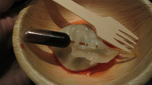 Small pipettes of soy sauce were served alongside some of the dumplings.  It looked cool, but when people started dropping them on the floor...there were a few ruined shoes.