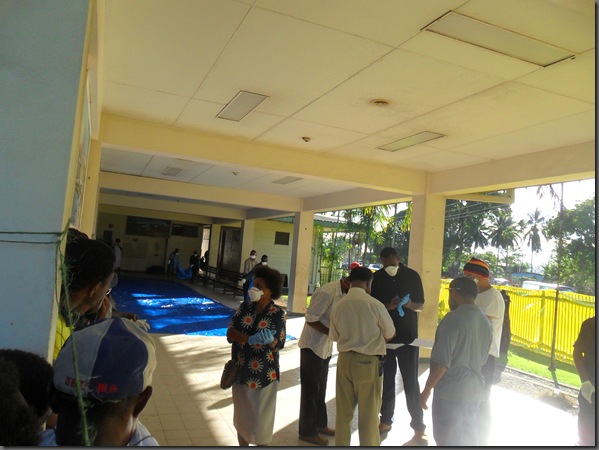 First body being brought to layout area. by Martyn Namorong