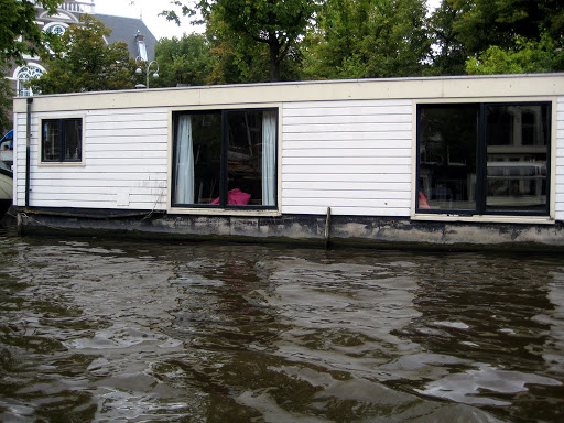 Some houseboats are just shacks on a barge/platform