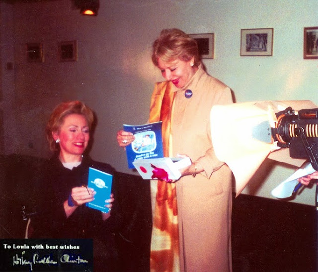 Copy of Hillary Clinton US First Lady holding OA ticket with Loula Loi Alafoyiannis.jpg