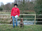 Lucie & Merlot after completing the water and achieving Field Trial Champion status