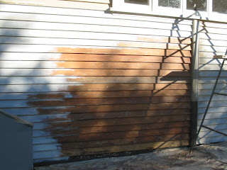 Removing the old paint from an Onehunga Community Building