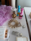A random grouping of metallic items. Stainless steel cubes and a bud vase from Jayson Home and Garden. Pink and blue Nicholas Feuillatte Champagne minis.