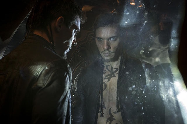 Valentine (Jonathan Rhys Meyers) stares at the portal in Screen Gems fantasy-action THE MORTAL INSTRUMENTS: CITY OF BONES.