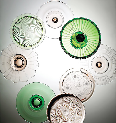 Often called Depression glass, this tinted tableware emerged during the 1930's when the country needed perking up (movie theaters regularly gave out glasses and pitchers made of colored pressed glass as freebies).