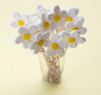 When I set out to find a lollipop, I knew I needed something special…so I had this specially created for me! These adorable lollipops have pure white petals with a sweet yellow center.