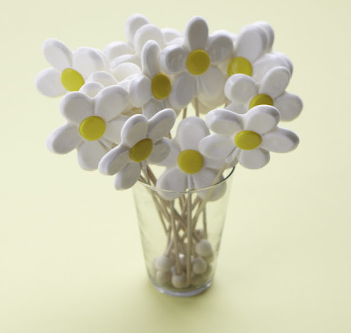 When I set out to find a lollipop, I knew I needed something special…so I had this specially created for me! These adorable lollipops have pure white petals with a sweet yellow center. When I set out to find a lollipop, I knew I needed something special…so I had this specially created for me! These adorable lollipops have pure white petals with a sweet yellow center.