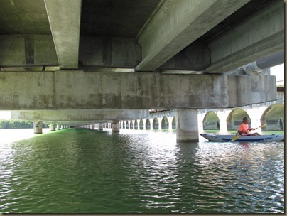 al kayaking under bridge al kayaking under bridge
