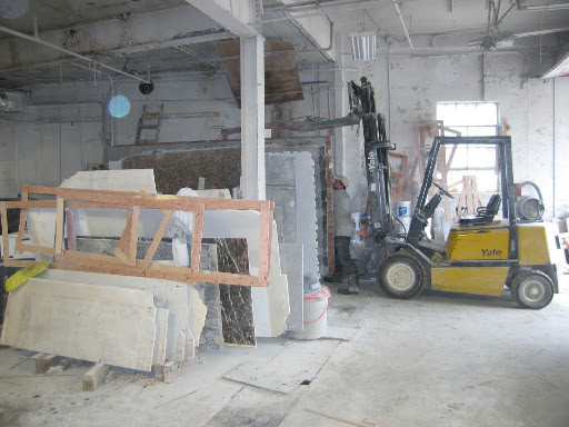 The crew at Westchester Granite and Marble (marbleandgraniteworks.com) found me the exact slab of black marble.