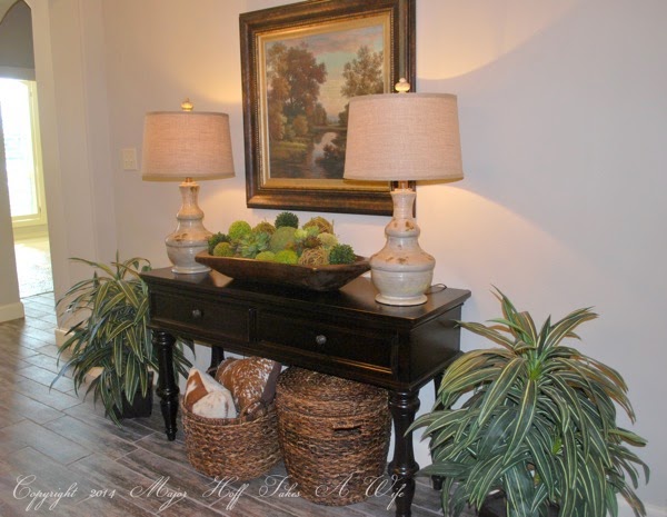 entry way table with moss balls in french wooden dough bowl.jpg Entry way table with moss balls in french wooden dough bowl