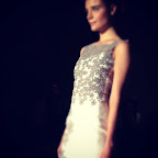 Love the flower detailing on this dress.