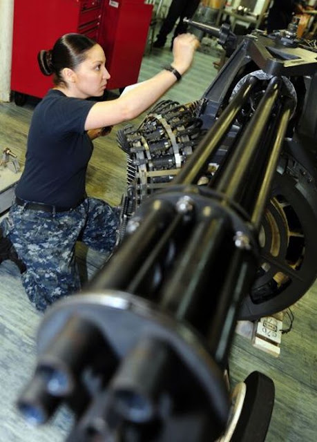 111023-N-QL471-080  ARABIAN GULF (Oct. 23, 2011) Aviation Ordnanceman Airman Laticia Workman performs an inspection on an M61A-2 Vulcan 20 mm Gatling gun aboard the aircraft carrier USS George H.W. Bush (CVN 77). George H.W. Bush is deployed to the U.S. 5th Fleet area of responsibility on its first operational deployment conducting maritime security operations and support missions as part of Operations Enduring Freedom and New Dawn. (U.S. Navy photo by Mass Communication Specialist 3rd Class Billy Ho/Released) 