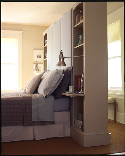 I love how these Architect's lamps are tucked into this room dividing headboard. I love how these Architect's lamps are tucked into this room dividing headboard.