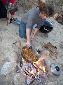 Jeff stirring Gina's apricot stuffing