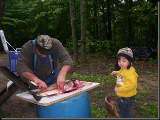 koko and grandpa cleaning fish