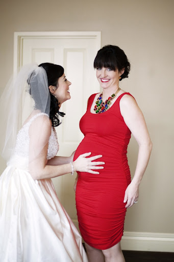 My sister and matron of honor, Maggie Storino, was 8 months pregnant at our wedding. How gorgeous does she look in this rockin' red dress by Isabella Oliver? My sister and matron of honor, Maggie Storino, was 8 months pregnant at our wedding. How gorgeous does she look in this rockin' red dress by Isabella Oliver?