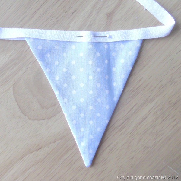 flag pinned to cotton tape