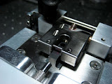 The Counterbore Precision Measurement Machine is calibrated using a hardened-steel "taring slug".