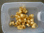 Golden curls of vellum paper chains.