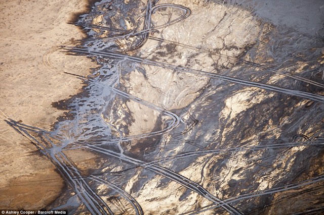 Aerial view of tailings ponds at the Alberta Tar Sands mine, 17 October 2012. Ashley Cooper / Barcroft Media